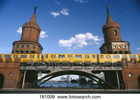 Train traveling across a bridge, Berlin, Germany View Large Photo Image Stock Photo - Train traveling across a bridge, Berlin, Germany. Fotosearch