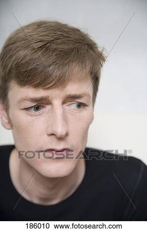Stock Image - Man looking away. Fotosearch