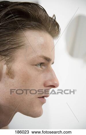 Side view of man looking away View Large Photo Image Stock Image - Side view of man looking away. Fotosearch