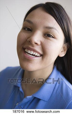 Young Native American woman smiling View Large Photo Image Stock Photograph - Young Native American woman smiling. Fotosearch
