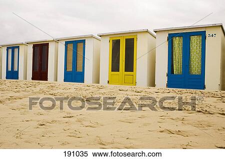 Beach huts on sand in a row View Large Photo Image Stock Photography - Beach huts on sand in a row. Fotosearch