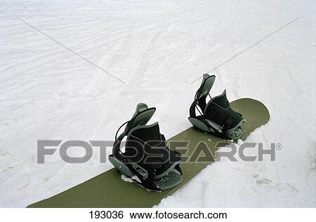 Snowboard on ski slope View Large Photo Image Stock Photograph - Snowboard on ski slope. Fotosearch