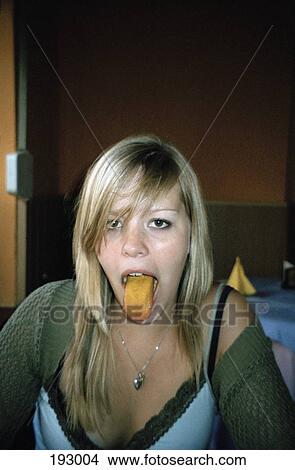 Young woman with yellow tongue View Large Photo Image Picture - Young woman with yellow tongue. Fotosearch