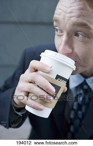 Businessman drinking coffee View Large Photo Image Stock Image - Businessman drinking coffee. Fotosearch