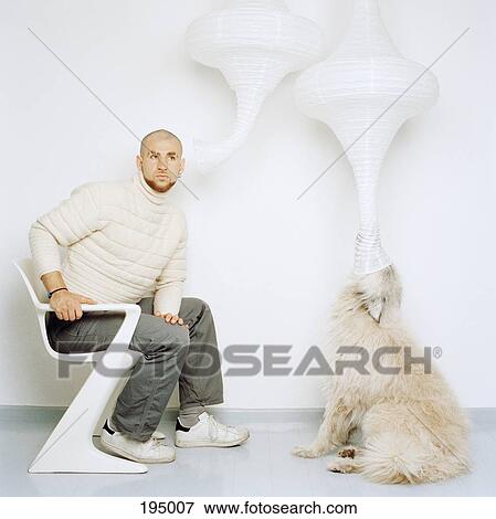 A dog and a man communicating View Large Photo Image Stock Photo - A dog and a man communicating. Fotosearch
