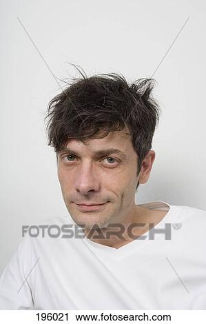 A man with disheveled hair View Large Photo Image Stock Image - A man with disheveled hair. Fotosearch