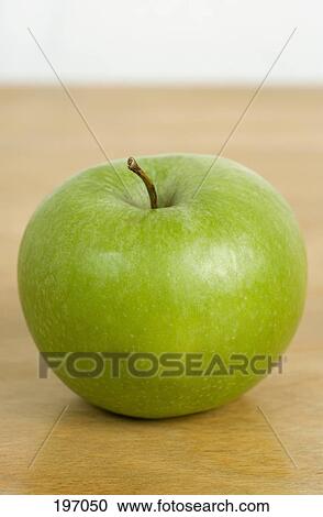 Stock Image - A green apple. Fotosearch