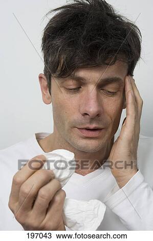 A man with a sinus headache View Large Photo Image Stock Image - A man with a sinus headache. Fotosearch