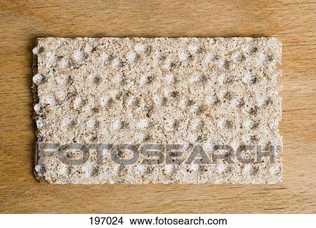 Picture - A piece of unleven bread. Fotosearch