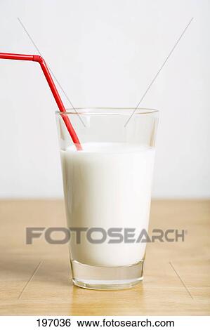 A red straw in a glass of milk View Large Photo Image Stock Photograph - A red straw in a glass of milk. Fotosearch
