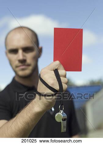 A referee holding up a red card View Large Photo Image Stock Photography - A referee holding up a red card. Fotosearch