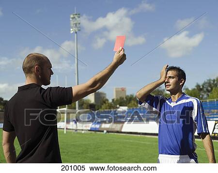 A soccer player being given a red card View Large Photo Image Stock Photography - A soccer player being given a red card. Fotosearch