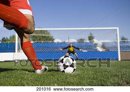 Two soccer players taking a break View Large Photo Image Stock Photograph - Two soccer players taking a break. Fotosearch