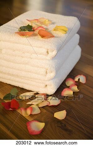 Pile of folded white towels View Large Photo Image Stock Image - Pile of folded white towels. Fotosearch