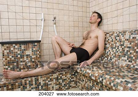 Man reclining in steam room View Large Photo Image Stock Photo - Man reclining in steam room. Fotosearch
