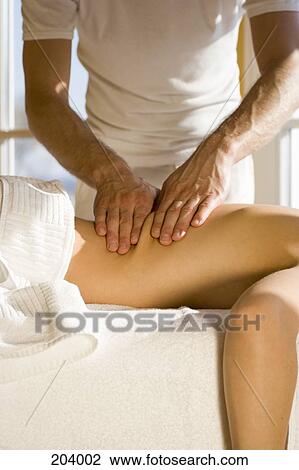 Young woman receiving back massage View Large Photo Image Stock Image - Young woman receiving back massage. Fotosearch
