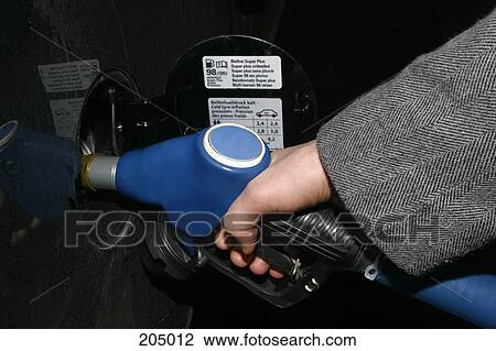 Man pumping gas View Large Photo Image Stock Image - Man pumping gas. Fotosearch