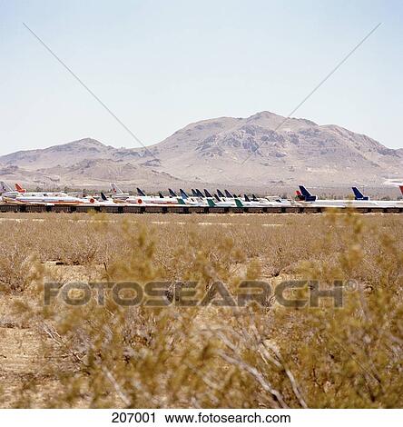 Group of airplanes in a field View Large Photo Image Stock Image - Group of airplanes in a field. Fotosearch