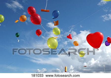 Colored helium balloons with messages floating in the sky above View Large Photo Image Stock Image - Colored helium balloons with messages floating in the sky above. Fotosearch