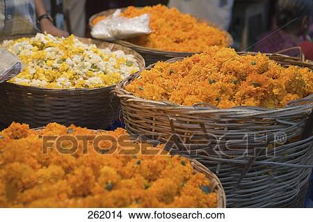 Baskets full of flowers at market, Mumbai, India View Large Photo Image Picture - Baskets full of flowers at market, Mumbai, India. Fotosearch
