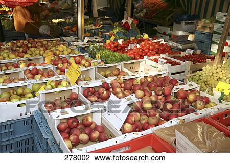 Stock Image - Assorted fruit and vegetables at market. Fotosearch