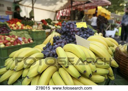 Bananas and grapes at farmer’s market View Large Photo Image Stock Photography - Bananas and grapes at farmer’s market. Fotosearch