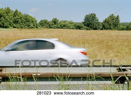 Car traveling on highway View Large Photo Image Stock Image - Car traveling on highway. Fotosearch