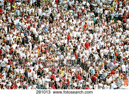 Stock Image - Crowd in sports stadium. Fotosearch