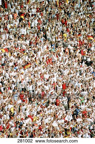 Crowd in sports stadium with arms in air View Large Photo Image Stock Image - Crowd in sports stadium with arms in air. Fotosearch