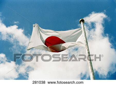 Stock Photo - Japanese flag flapping in wind. Fotosearch