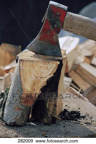 Axe wedged into tree stump View Large Photo Image Stock Photo - Axe wedged into tree stump. Fotosearch