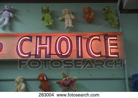 Teddy bears surrounding ‘choice’ neon sign View Large Photo Image Picture - Teddy bears surrounding ‘choice’ neon sign. Fotosearch