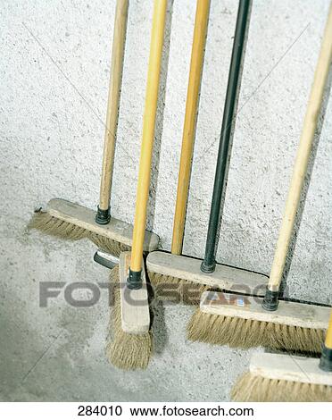 Stock Image - Collection of brooms. Fotosearch