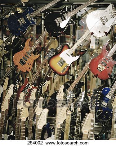 Collection of electric guitars View Large Photo Image Stock Image - Collection of electric guitars. Fotosearch
