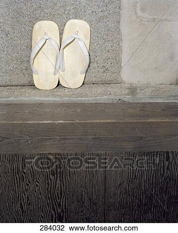 Pair of Japanese Geta sandals leaning up against wall View Large Photo Image Stock Image - Pair of Japanese Geta sandals leaning up against wall. Fotosearch