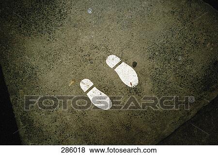 Stock Photo - Shoe print on street corner. Fotosearch