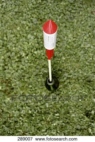 Bottle rocket aimed for launch on grass View Large Photo Image Stock Photo - Bottle rocket aimed for launch on grass. Fotosearch