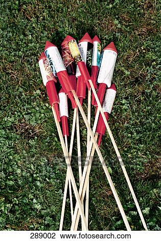 Bottle rockets on grass View Large Photo Image Stock Image - Bottle rockets on grass. Fotosearch