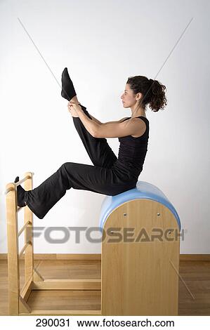 Woman exercising on pommel horse View Large Photo Image Stock Image - Woman exercising on pommel horse. Fotosearch