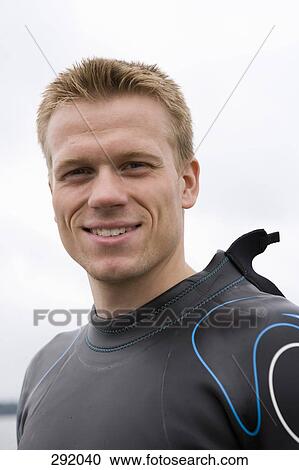 Portrait of triathlete wearing a wetsuit View Large Photo Image Stock Image - Portrait of triathlete wearing a wetsuit. Fotosearch