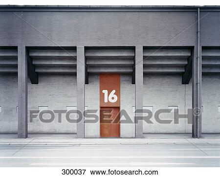 Building exterior with number above door View Large Photo Image Stock Photo - Building exterior with number above door. Fotosearch
