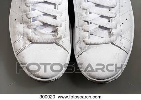 Close-up of white sports shoes View Large Photo Image Stock Image - Close-up of white sports shoes. Fotosearch