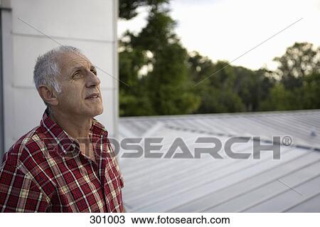 Stock Image - Man looking at view. Fotosearch