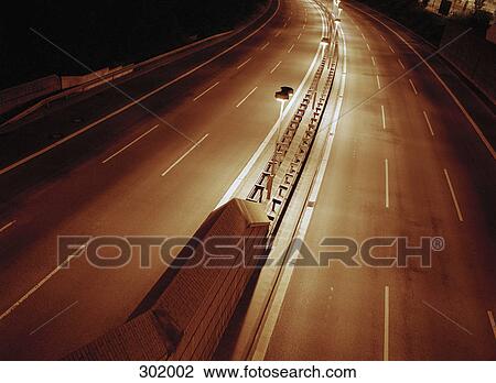 Empty highway at night View Large Photo Image Stock Image - Empty highway at night. Fotosearch
