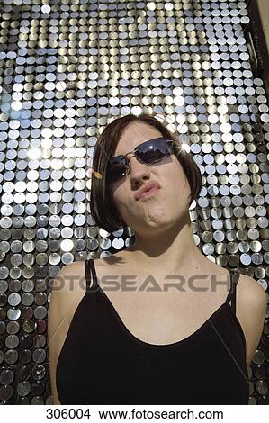 Woman posing and making a face View Large Photo Image Picture - Woman posing and making a face. Fotosearch