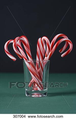 Candy canes in a glass View Large Photo Image Picture - Candy canes in a glass. Fotosearch
