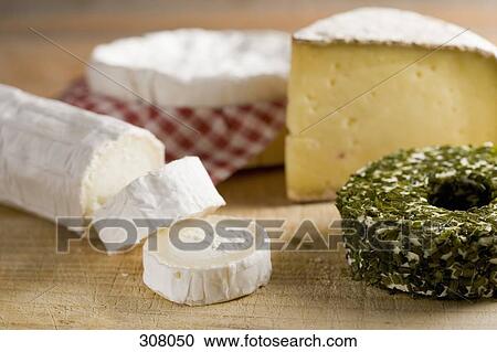 Close up of assorted cheeses View Large Photo Image Stock Image - Close up of assorted cheeses. Fotosearch