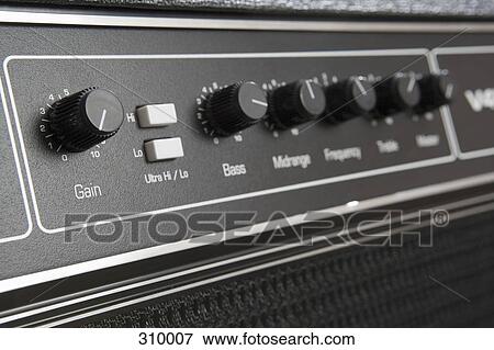 Stock Photo - Close up of dials on sound mixer. Fotosearch