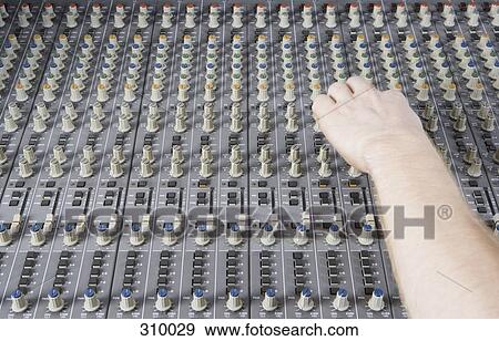 Hand operating sound mixer View Large Photo Image Stock Photo - Hand operating sound mixer. Fotosearch