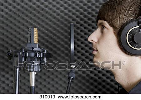 Man in sound booth of recording studio View Large Photo Image Stock Photo - Man in sound booth of recording studio. Fotosearch